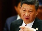 Chinese President Xi Jinping is seen. Regulatory scrutiny has increased in China, leading to stricter travel policies and layoffs, as the government aims to reshape the financial sector amid a sluggish economy.