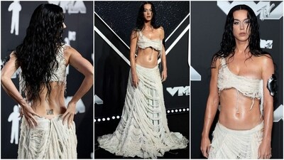 Katy Perry dazzles at the 2024 MTV VMAs in a bold two-piece deconstructed outfit. Featuring a one-shoulder bralette and a matching low-waist skirt, she perfectly rocks the wet and wild look. (Instagram) Katy Perry dazzles at the 2024 MTV VMAs in a bold two-piece deconstructed outfit. Featuring a one-shoulder bralette and a matching low-waist skirt, she perfectly rocks the wet and wild look. (Instagram)