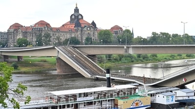 View of the broken part of the Carola Bridge (Carolabruecke) which collapsed into the Elbe, in Dresden, Germany. Germany: Dresden bridge collapse causes travel chaos. Is your trip at risk? (REUTERS/Matthias Rietschel)
