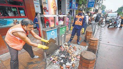 MCD workers seen cleaning the streets of Chandni Chowk in Old Delhi on Thursday. (Photo by Sanchit Khanna/ Hindustan Times)