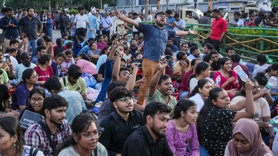 Kolkata: Junior doctors shout slogans as they sit on a dharna after the police stopped their protest march towards Swasthya Bhawan over the RG Kar Hospital rape and murder. (PTI) Kolkata: Junior doctors shout slogans as they sit on a dharna after the police stopped their protest march towards Swasthya Bhawan over the RG Kar Hospital rape and murder. (PTI)