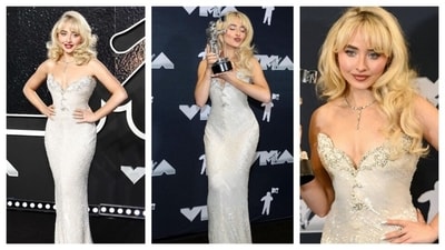 Sabrina Carpenter channeled Old Hollywood glam with a Marilyn Monroe aesthetic and Madonna’s style. Staying true to her signature light feminine styling, the pop star wore a shimmery strapless gown adorned with dazzling sequins. Her romantic sweetheart neckline featured an intricate silver beaded design. In 1991, Madonna wore this archival Bob Mackie gown dress to the Oscars, inspired by Marilyn Monroe in Gentlemen Prefer Blondes. Sabrina won the Song of the Year award for her hit song Espresso. (Instagram) Sabrina Carpenter channeled Old Hollywood glam with a Marilyn Monroe aesthetic and Madonna’s style. Staying true to her signature light feminine styling, the pop star wore a shimmery strapless gown adorned with dazzling sequins. Her romantic sweetheart neckline featured an intricate silver beaded design. In 1991, Madonna wore this archival Bob Mackie gown dress to the Oscars, inspired by Marilyn Monroe in Gentlemen Prefer Blondes. Sabrina won the Song of the Year award for her hit song Espresso. (Instagram)