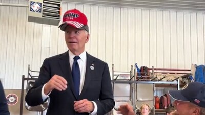 Biden shocks netizens as he wears red Trump hat during Shanksville visit (@CollinRugg/X) Biden shocks netizens as he wears red Trump hat during Shanksville visit (@CollinRugg/X)
