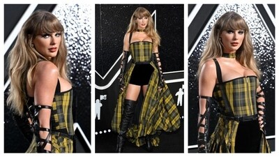 Taylor Swift stunned at the 2024 MTV VMAs, giving Cher Horowitz's iconic yellow dress a fierce, punk-rock makeover. She rocked an edgy, glam-punk look with a fitted mustard-yellow and black plaid corset dress, complete with a skirt that parted to reveal dramatic black shorts. (Instagram) Taylor Swift stunned at the 2024 MTV VMAs, giving Cher Horowitz's iconic yellow dress a fierce, punk-rock makeover. She rocked an edgy, glam-punk look with a fitted mustard-yellow and black plaid corset dress, complete with a skirt that parted to reveal dramatic black shorts. (Instagram)