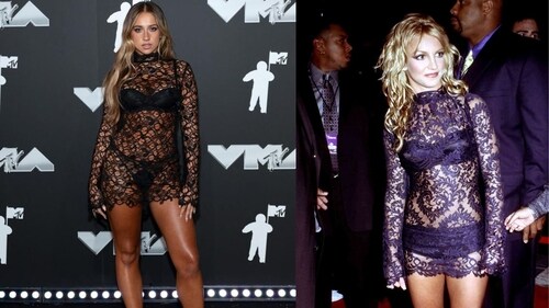 Tate McRae pays tribute to Britney Spears by recreating her 2001 VMAs red carpet look. Tate McRae pays tribute to Britney Spears by recreating her 2001 VMAs red carpet look.