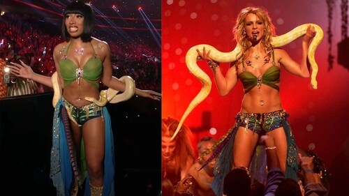 Megan replicated Britney's snake-wielding "I'm A Slave 4 U" performance from 2001 VMAs. Megan replicated Britney's snake-wielding "I'm A Slave 4 U" performance from 2001 VMAs.