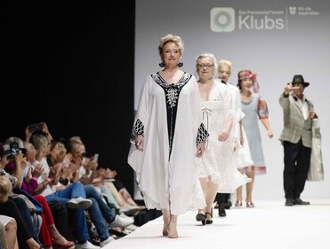 Members of a group of retired people present their own line of upcycled clothes the Vienna Fashion week at the Museum Quartier in Vienna. (Photo by Joe Klamar / AFP) Members of a group of retired people present their own line of upcycled clothes the Vienna Fashion week at the Museum Quartier in Vienna. (Photo by Joe Klamar / AFP)