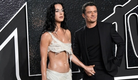 Katy Perry and Orlando Bloom walked hand-in-hand on the black carpet. Katy Perry and Orlando Bloom walked hand-in-hand on the black carpet.