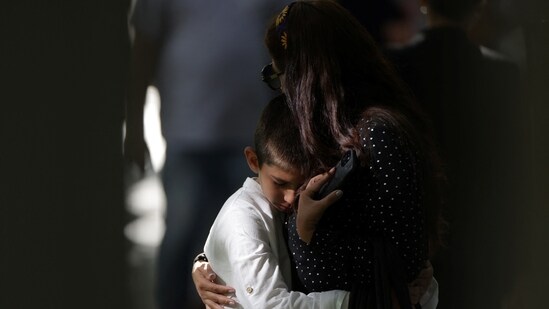 Relatives, friends, co-workers and people who had died in the attacks as well as survivors and their families visited the 9/11 memorial to grieve their losses. A moment of silence at 8 am was observed before starting a ceremony to pay tribute to those lost( REUTERS/Kent J.Edwards)