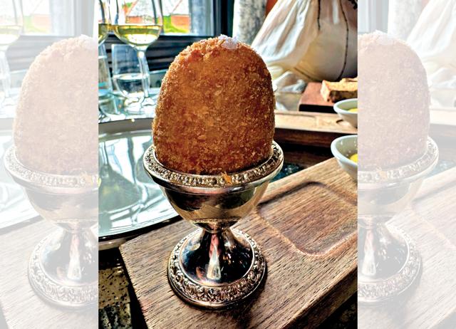 Heston Blumenthal’s iconic wet-centre Scotch Egg features on the menu at The Hinds Head. Heston Blumenthal’s iconic wet-centre Scotch Egg features on the menu at The Hinds Head.