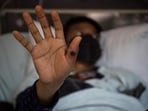 A patient showing his hand with a sore caused by an infection of the monkeypox virus, in the isolation area for monkeypox patients at the Arzobispo Loayza hospital, in Lima, Peru. (Photo by Ernesto BENAVIDES / AFP)