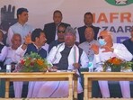 Congress President Mallikarjun Kharge with party leader Ghulam Ahmad Mir and Jammu and Kashmir National Conference (JKNC) President Farooq Abdullah during a public meeting for Jammu and Kashmir Assembly elections, in Anantnag. Congress President Mallikarjun Kharge with party leader Ghulam Ahmad Mir and Jammu and Kashmir National Conference (JKNC) President Farooq Abdullah during a public meeting for Jammu and Kashmir Assembly elections, in Anantnag.