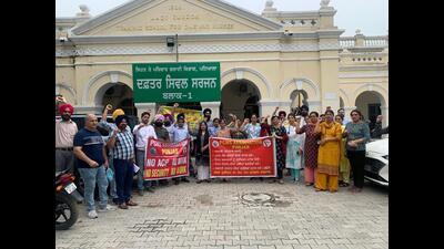 Members of the Punjab Civil Medical Services Association during a protest at the civil surgeon’s office in Patiala on Friday. Members of the Punjab Civil Medical Services Association during a protest at the civil surgeon’s office in Patiala on Friday.