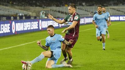 Mohun Bagan Super Giants and Mumbai City FC players vie for the ball during their ISL match in Kolkata on Friday. (PTI) Mohun Bagan Super Giants and Mumbai City FC players vie for the ball during their ISL match in Kolkata on Friday. (PTI)
