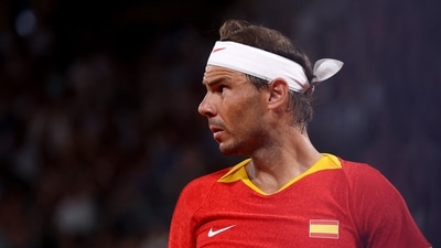 Rafael Nadal of Spain reacts during a match. (REUTERS)