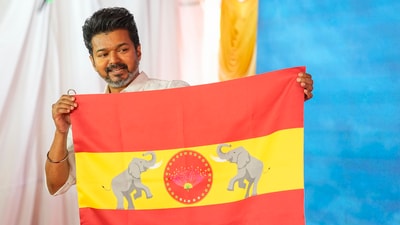 Chennai: Actor-turned-politician and Tamilaga Vettri Kazhagam President Vijay unveils party's flag at party headquarters, on the outskirts of Chennai, Thursday, Aug. 22, 2024. (PTI Photo/R Senthilkumar) (PTI) Chennai: Actor-turned-politician and Tamilaga Vettri Kazhagam President Vijay unveils party's flag at party headquarters, on the outskirts of Chennai, Thursday, Aug. 22, 2024. (PTI Photo/R Senthilkumar) (PTI)