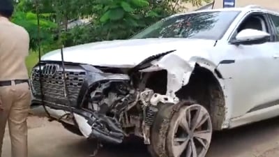 A police personnel near the damaged Audi owned by Maharashtra BJP chief Chandrashekhar Bawankule's son Sanket Bawankule. (PTI) A police personnel near the damaged Audi owned by Maharashtra BJP chief Chandrashekhar Bawankule's son Sanket Bawankule. (PTI)