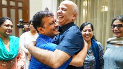 Delhi Chief Minister Arvind Kejriwal being greeted by party leader Manish Sisodia as he arrives at his residence after being released from Tihar Jail on bail. (PTI Photo) (PTI) Delhi Chief Minister Arvind Kejriwal being greeted by party leader Manish Sisodia as he arrives at his residence after being released from Tihar Jail on bail. (PTI Photo) (PTI)