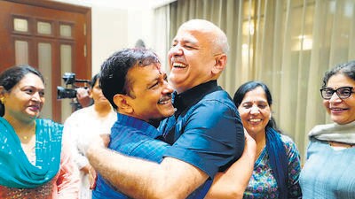 Senior AAP leader and former Deputy Chief Minister Manish Sisodia hugs Chief Minister Arvind Kejriwal at the latter’s Civil Lines residence on Friday, after his release from Tihar Jail. ((HT Photo) Senior AAP leader and former Deputy Chief Minister Manish Sisodia hugs Chief Minister Arvind Kejriwal at the latter’s Civil Lines residence on Friday, after his release from Tihar Jail. ((HT Photo)