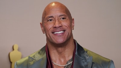 Dwayne 'The Rock' Johnson reflects on the definition of true masculinity while in talks for his upcoming film, Moana 2. (File Photo/AP) Dwayne 'The Rock' Johnson reflects on the definition of true masculinity while in talks for his upcoming film, Moana 2. (File Photo/AP)