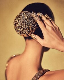 Gold hair bun with floral details from Kavya Potluri. (Photo: Instagram/kavyapotluriofficial) Gold hair bun with floral details from Kavya Potluri. (Photo: Instagram/kavyapotluriofficial)