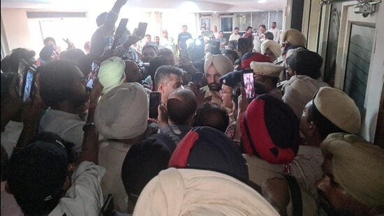 Jalandhar district congress committee leaders and workers on the premises of the MC. (HT Photo)