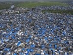 An aerial view of slums adjoining the 326-acre Deonar dumping ground. Only 70 acres would be required for the rental housing project, said officials. (Satish Bate/ Hindustan Times)