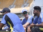 Morne Morkel (in middle) with Mohammed Siraj (R) and Jasprit Bumrah