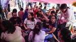 Members of the Junior Doctors Forum block a road leading to the West Bengal Health Headquarters during their protest against the rape and murder of a resident doctor at a government hospital in early August, in Kolkata on Friday. (AP)