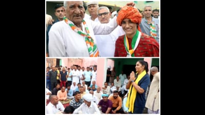 An elderly man gives his blessings to wrestler Vinesh Phogat and (right) grappler Kavita Dalal speaks to people in Julana. (MANOJ DAKHA/HT) An elderly man gives his blessings to wrestler Vinesh Phogat and (right) grappler Kavita Dalal speaks to people in Julana. (MANOJ DAKHA/HT)