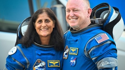 (FILES) NASA astronauts Butch Wilmore (R) and Suni Williams, wearing Boeing spacesuits, (Photo by Miguel J. Rodriguez Carrillo / AFP) (AFP) (FILES) NASA astronauts Butch Wilmore (R) and Suni Williams, wearing Boeing spacesuits, (Photo by Miguel J. Rodriguez Carrillo / AFP) (AFP)