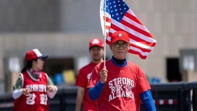 MILWAUKEE, WISCONSIN - July 17: Members of the Rod of Iron Ministries, an offshoot of the Unification Church, march around the security zone near Fiserv Forum in support of Former President Donald Trump and the GOP as the RNC continues on July 17, 2024 in Milwaukee, Wisconsin. They came to show their support for Former President Donald Trump and the GOP. Jim Vondruska/Getty Images/AFP (Photo by Jim Vondruska / GETTY IMAGES NORTH AMERICA / Getty Images via AFP) (Getty Images via AFP) MILWAUKEE, WISCONSIN - July 17: Members of the Rod of Iron Ministries, an offshoot of the Unification Church, march around the security zone near Fiserv Forum in support of Former President Donald Trump and the GOP as the RNC continues on July 17, 2024 in Milwaukee, Wisconsin. They came to show their support for Former President Donald Trump and the GOP. Jim Vondruska/Getty Images/AFP (Photo by Jim Vondruska / GETTY IMAGES NORTH AMERICA / Getty Images via AFP) (Getty Images via AFP)