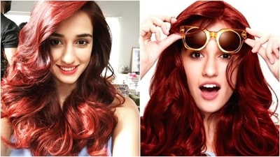 Disha Patani, known for her long, voluminous hair, often keeps it in its natural glory. However, once, she surprised her fans by dyeing them red, and it has to be one of her best looks. Disha Patani, known for her long, voluminous hair, often keeps it in its natural glory. However, once, she surprised her fans by dyeing them red, and it has to be one of her best looks. 