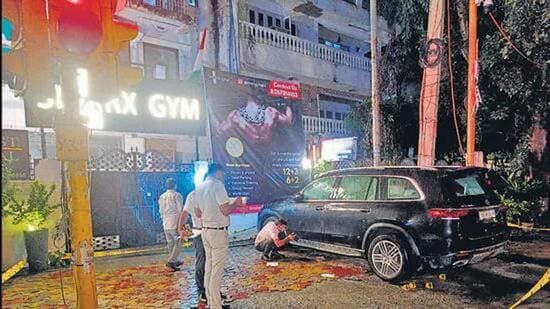 The accused allegedly fired at the gym owner and while leaving, also fired at his Mercedes car. (HT Photo)