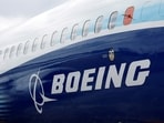 The Boeing logo is seen on the side of a Boeing 737 MAX at the Farnborough International Airshow.