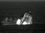 This still image taken from a SpaceX and Polaris broadcast on September 15, 2024, shows the manned Polaris Dawn mission's "Dragon" capsule splashing down off the coast of Dry Tortugas, Florida, completing the first human spaceflight mission by non-government astronauts of the Polaris Program.