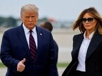 US President Donald Trump walks with first lady Melania Trump at Cleveland Hopkins International Airport in Cleveland, Ohio,  on September 29.