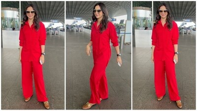 Rakul Preet Singh aces the monochrome trend with her latest airport look, flaunting a red co-ord set paired with black sunglasses and flats for effortless style. (Instagram) Rakul Preet Singh aces the monochrome trend with her latest airport look, flaunting a red co-ord set paired with black sunglasses and flats for effortless style. (Instagram)