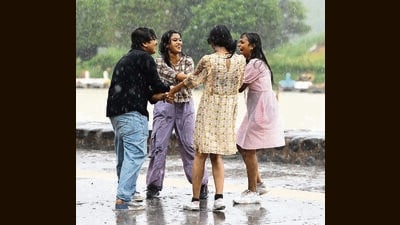 A group of friends delighted by the sudden showers at Sukhna Lake in Chandigarh on Sunday. (Keshav Singh/HT) A group of friends delighted by the sudden showers at Sukhna Lake in Chandigarh on Sunday. (Keshav Singh/HT)