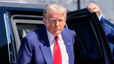 Republican presidential nominee former President Donald Trump arrives at Harry Reid International Airport to board a plane after a campaign trip, Saturday, Sept.14, 2024, in Las Vegas. (AP Photo/Alex Brandon) (AP)