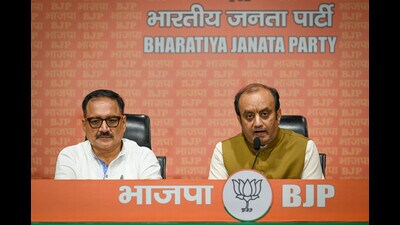 BJP spokesperson Sudhanshu Trivedi (right) and Delhi BJP chief Virendra Sachdeva (left) address a press conference at the party headquarters on Sunday. (Sanchit Khanna/ HT Photo) BJP spokesperson Sudhanshu Trivedi (right) and Delhi BJP chief Virendra Sachdeva (left) address a press conference at the party headquarters on Sunday. (Sanchit Khanna/ HT Photo)
