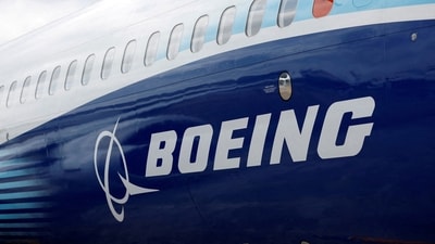 The Boeing logo is seen on the side of a Boeing 737 MAX at the Farnborough International Airshow. (Reuters)