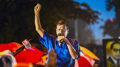 Delhi chief minister Arvind Kejriwal addresses supporters amid rainfall after walking out of the Tihar Jail in New Delhi on September 13. (PTI) Delhi chief minister Arvind Kejriwal addresses supporters amid rainfall after walking out of the Tihar Jail in New Delhi on September 13. (PTI)