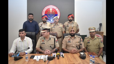 Police officials during a press conference in Jalandhar on Sunday. (HT photo) Police officials during a press conference in Jalandhar on Sunday. (HT photo)