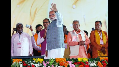 Prime Minister Narendra Modi waves to the crowd during the public meeting ahead of the Jharkhand Assembly elections, in Jamshedpur on Sunday. (ANI) Prime Minister Narendra Modi waves to the crowd during the public meeting ahead of the Jharkhand Assembly elections, in Jamshedpur on Sunday. (ANI)