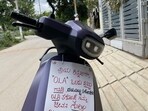 Nisha Gowri, an Ola customer in Bengaluru, attached a placard to her malfunctioning e-scooter, warning others against the purchase. Her online post received significant attention, highlighting dissatisfaction with Ola's product quality amid reports of other customers facing similar issues.