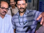 Kolkata: CBI officials take Tala Police Station Officer-in-Charge Abhijit Mondal (L) to produce him in a court after his arrest in connection with the R G Kar Medical College and Hospital incident at CGO Complex, in Kolkata, Sunday, Sept. 15, 2024. (PTI Photo) Kolkata: CBI officials take Tala Police Station Officer-in-Charge Abhijit Mondal (L) to produce him in a court after his arrest in connection with the R G Kar Medical College and Hospital incident at CGO Complex, in Kolkata, Sunday, Sept. 15, 2024. (PTI Photo)