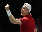 Canada's Denis Shapovalov celebrates winning his singles match against Britain's Daniel Evans