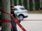 A law enforcement officer looks on after reports of shots fired outside Republican presidential nominee and former U.S. President Donald Trump's Trump International Golf Course in West Palm Beach, Florida, U.S. September 15, 2024.  