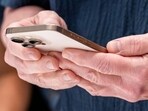Tim Cook, CEO of Apple with the iPhone 16 Pro in Desert Titanium. Tim Cook, CEO of Apple with the iPhone 16 Pro in Desert Titanium.